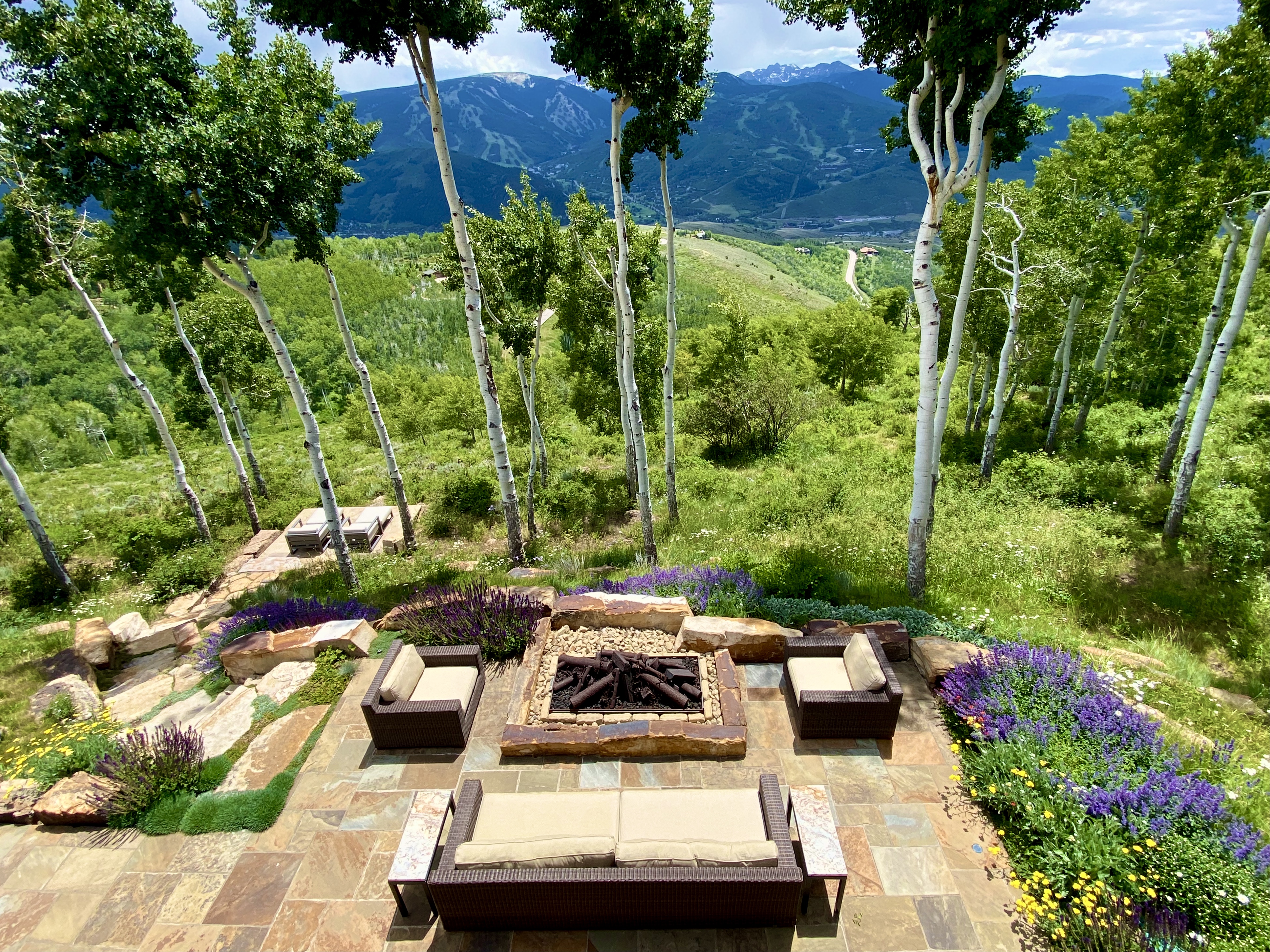 Residential outdoor space with designed grading and materials — Our Process page photography